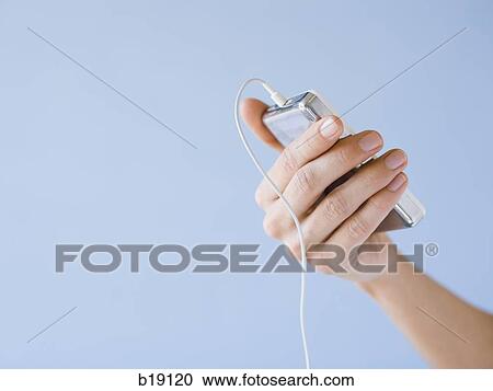 Caucasian Appearance, Digital Media Player, one young woman only, One Person, 25-29 years View Large Photo Image Stock Image - Caucasian Appearance, Digital Media Player, one young woman only, One Person, 25-29 years. Fotosearch