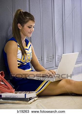 cheerleader in a school hallway View Large Photo Image Stock Image - cheerleader in a school hallway. Fotosearch