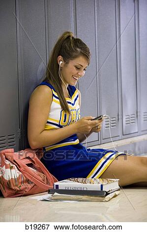cheerleader in a school hallway View Large Photo Image Stock Photo - cheerleader in a school hallway. Fotosearch