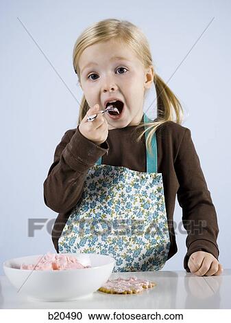 Stock Image - child baking. Fotosearch