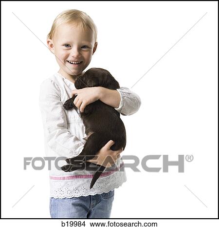 child with a puppy View Large Photo Image Picture - child with a puppy. Fotosearch