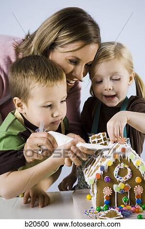Stock Image - children baking. Fotosearch