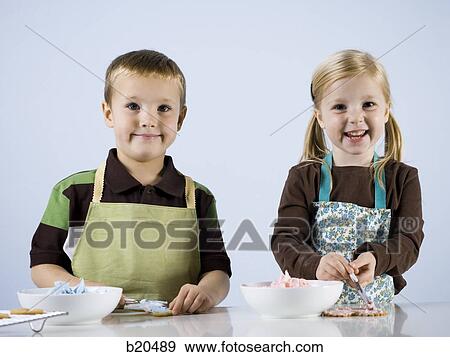 Stock Photo - children baking. Fotosearch