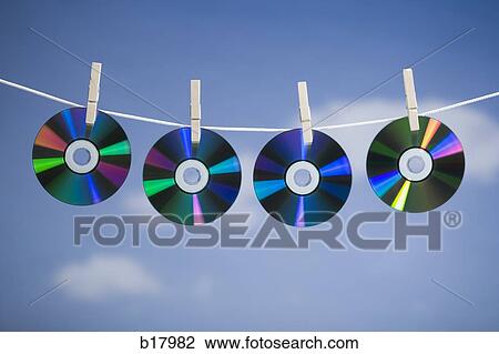 Compact disc hung out to dry. View Large Photo Image Stock Image - Compact disc hung out to dry.. Fotosearch