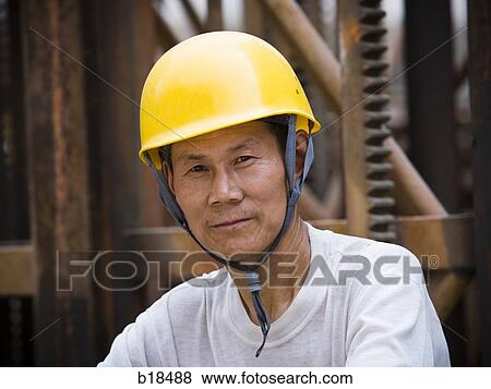 Construction worker on a job site. View Large Photo Image Stock Photo - Construction worker on a job site.. Fotosearch