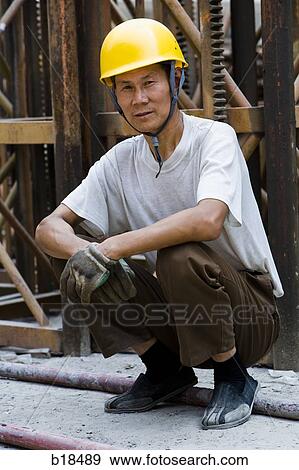 Construction worker on a job site. View Large Photo Image Stock Photo - Construction worker on a job site.. Fotosearch