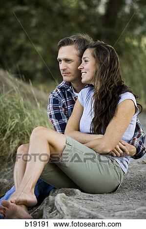 couple sitting together. View Large Photo Image Stock Image - couple sitting together.. Fotosearch