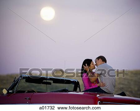 couple under a full moon View Large Photo Image Stock Image - couple under a full moon. Fotosearch