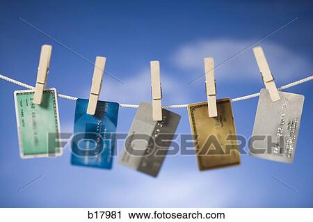 Credit cards hung out to dry. View Large Photo Image Stock Image - Credit cards hung out to dry.. Fotosearch