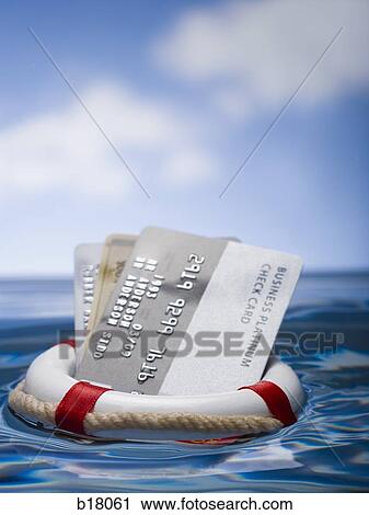 Credit cards in a life saver. View Large Photo Image Stock Image - Credit cards in a life saver.. Fotosearch