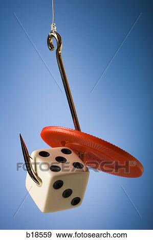 Die and chip on a fish hook. View Large Photo Image Stock Photo - Die and chip on a fish hook.. Fotosearch