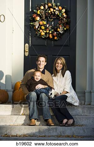 family sitting in doorway View Large Photo Image Stock Image - family sitting in doorway. Fotosearch