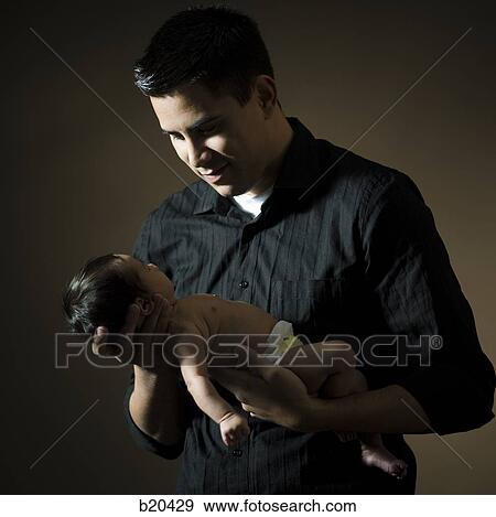 Stock Photo - father and baby. Fotosearch