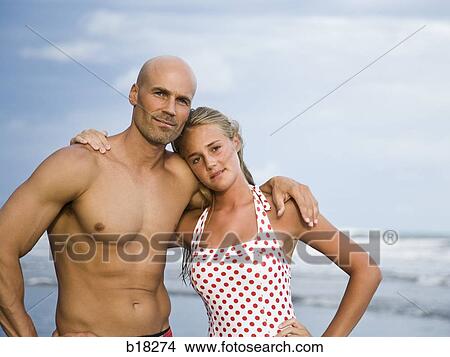 Father and daughter at the beach. View Large Photo Image Picture - Father and daughter at the beach.. Fotosearch