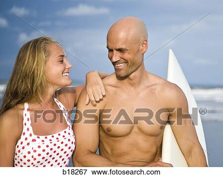 Father and daughter at the beach. View Large Photo Image Stock Photo - Father and daughter at the beach.. Fotosearch