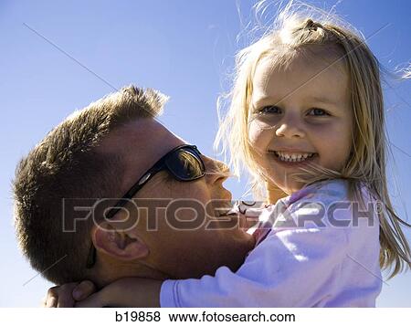 Stock Photo - father and little girl. Fotosearch