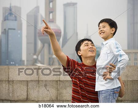 Father and son. View Large Photo Image Picture - Father and son.. Fotosearch