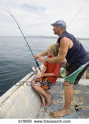 father and son sea fishing View Large Photo Image Stock Image - father and son sea fishing. Fotosearch