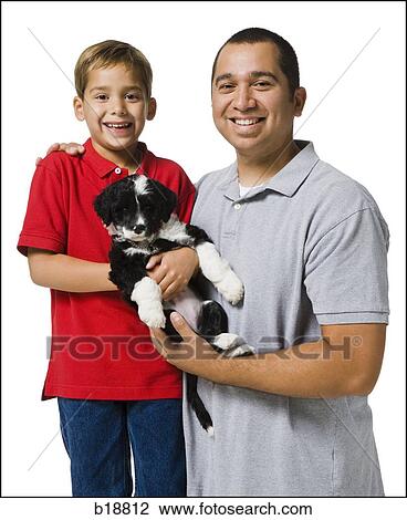 "father, son and puppy. " View Large Photo Image Stock Image - "father, son and puppy. ". Fotosearch