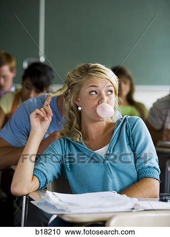 Femail Student in a classroom. View Large Photo Image Stock Image - Femail Student in a classroom.. Fotosearch