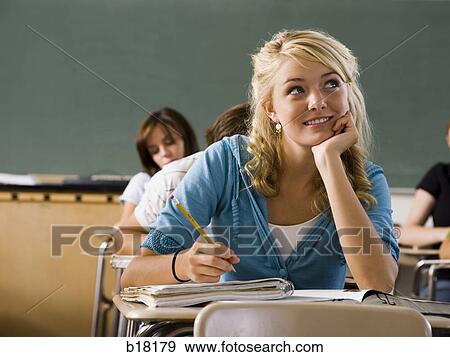 Femail Student in a classroom. View Large Photo Image Stock Photo - Femail Student in a classroom.. Fotosearch