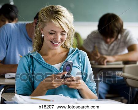 Femail Student in a classroom. View Large Photo Image Stock Photo - Femail Student in a classroom.. Fotosearch