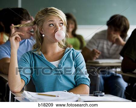 Femail Student in a classroom. View Large Photo Image Stock Photo - Femail Student in a classroom.. Fotosearch