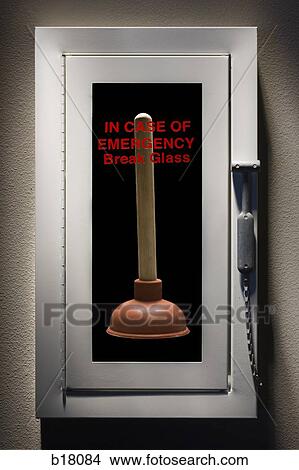 Picture - Fire alarm with a toilet plunger inside.. Fotosearch