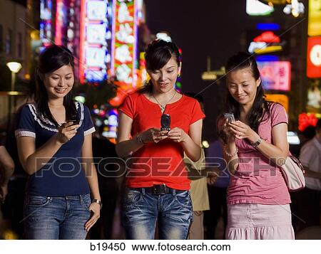Stock Image - fix middle girl's cheek with 6057. Fotosearch