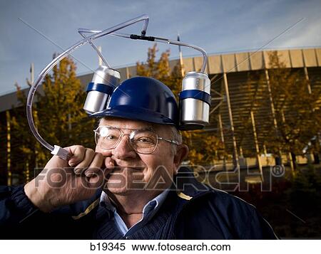 football fan with a beer helmet View Large Photo Image Stock Photography - football fan with a beer helmet. Fotosearch