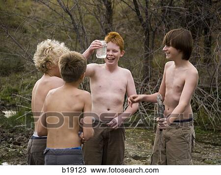 four boys playing in the woods. View Large Photo Image Stock Image - four boys playing in the woods.. Fotosearch