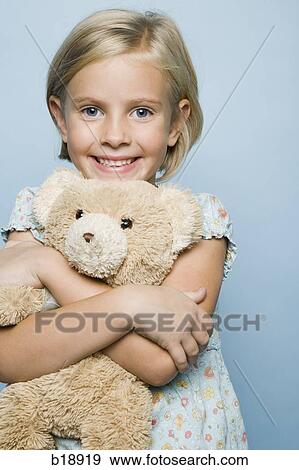 girl hugging teddy bear. View Large Photo Image Stock Photo - girl hugging teddy bear.. Fotosearch