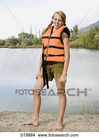 girl in a life vest View Large Photo Image Picture - girl in a life vest. Fotosearch