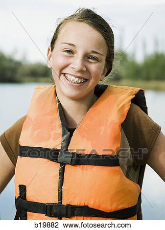 girl in a life vest View Large Photo Image Stock Image - girl in a life vest. Fotosearch