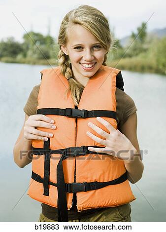girl in a life vest View Large Photo Image Stock Image - girl in a life vest. Fotosearch