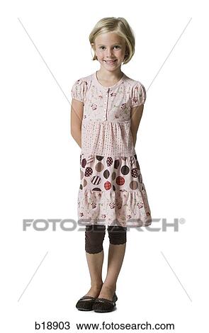 girl in a pink dress. View Large Photo Image Stock Image - girl in a pink dress.. Fotosearch