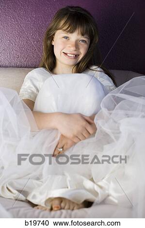 girl in a white dress View Large Photo Image Stock Image - girl in a white dress. Fotosearch