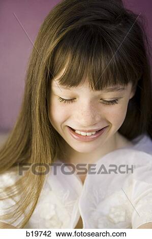 Stock Image - girl in a white dress. Fotosearch