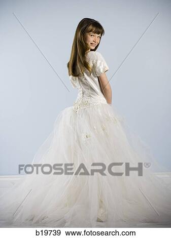 girl in a white dress View Large Photo Image Stock Photo - girl in a white dress. Fotosearch