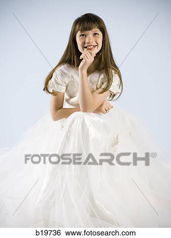 Stock Photograph - girl in a white dress. Fotosearch