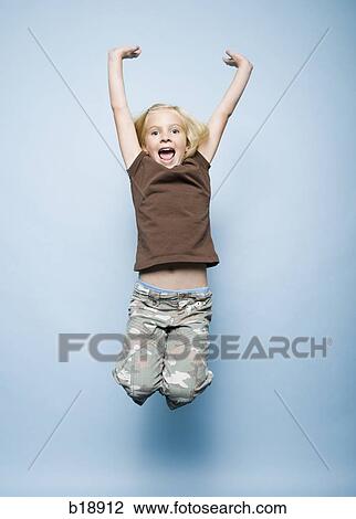 girl jumping in the air. View Large Photo Image Stock Image - girl jumping in the air.. Fotosearch