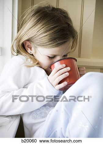 Stock Image - girl with a mug. Fotosearch