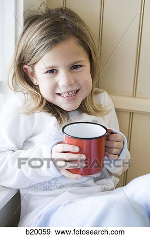 Stock Photo - girl with a mug. Fotosearch