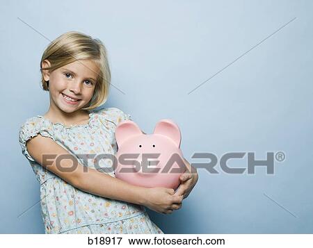 girl with a piggy bank. View Large Photo Image Stock Photo - girl with a piggy bank.. Fotosearch