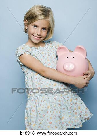 girl with a piggy bank. View Large Photo Image Stock Photo - girl with a piggy bank.. Fotosearch