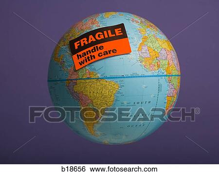 Stock Photograph - Globe with fragile sticker on it.. Fotosearch