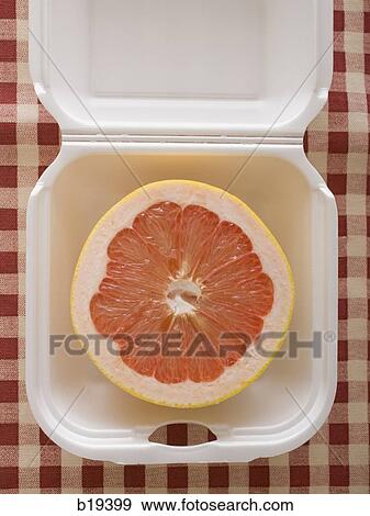 Stock Photo - grapefruit in a fast food container. Fotosearch