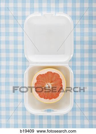 Stock Photo - grapefruit in a fast food container. Fotosearch