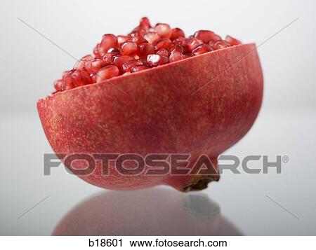 Half of a pomegranate. View Large Photo Image Stock Image - Half of a pomegranate.. Fotosearch