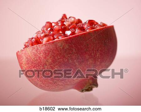 Half of a pomegranate. View Large Photo Image Stock Image - Half of a pomegranate.. Fotosearch